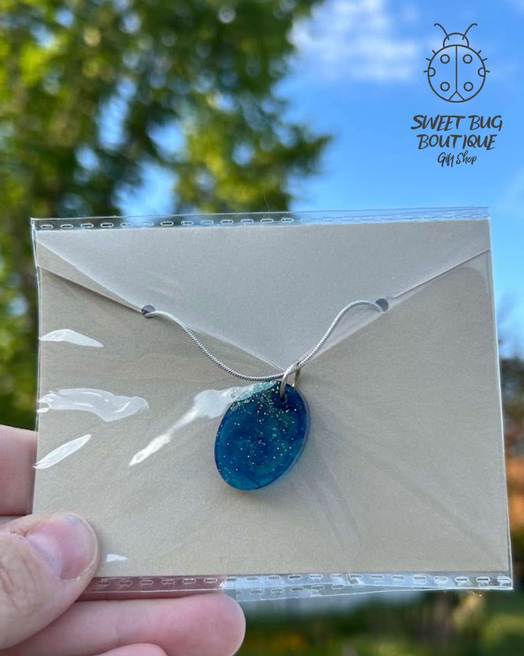 Necklace with Handmade Pendent Blue Glitter Resin Small Oval